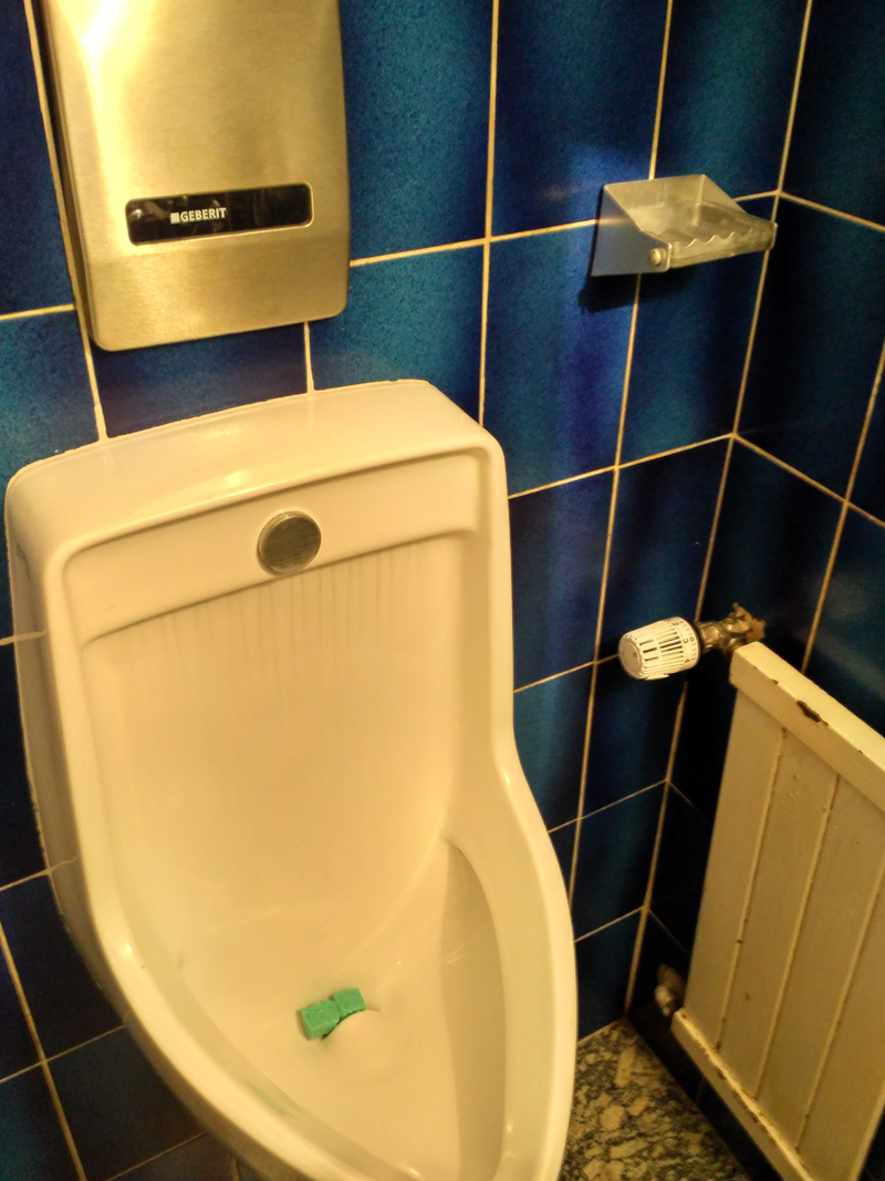 Curious Swiss ashtray at a toilet. Hadn’t seen one before.